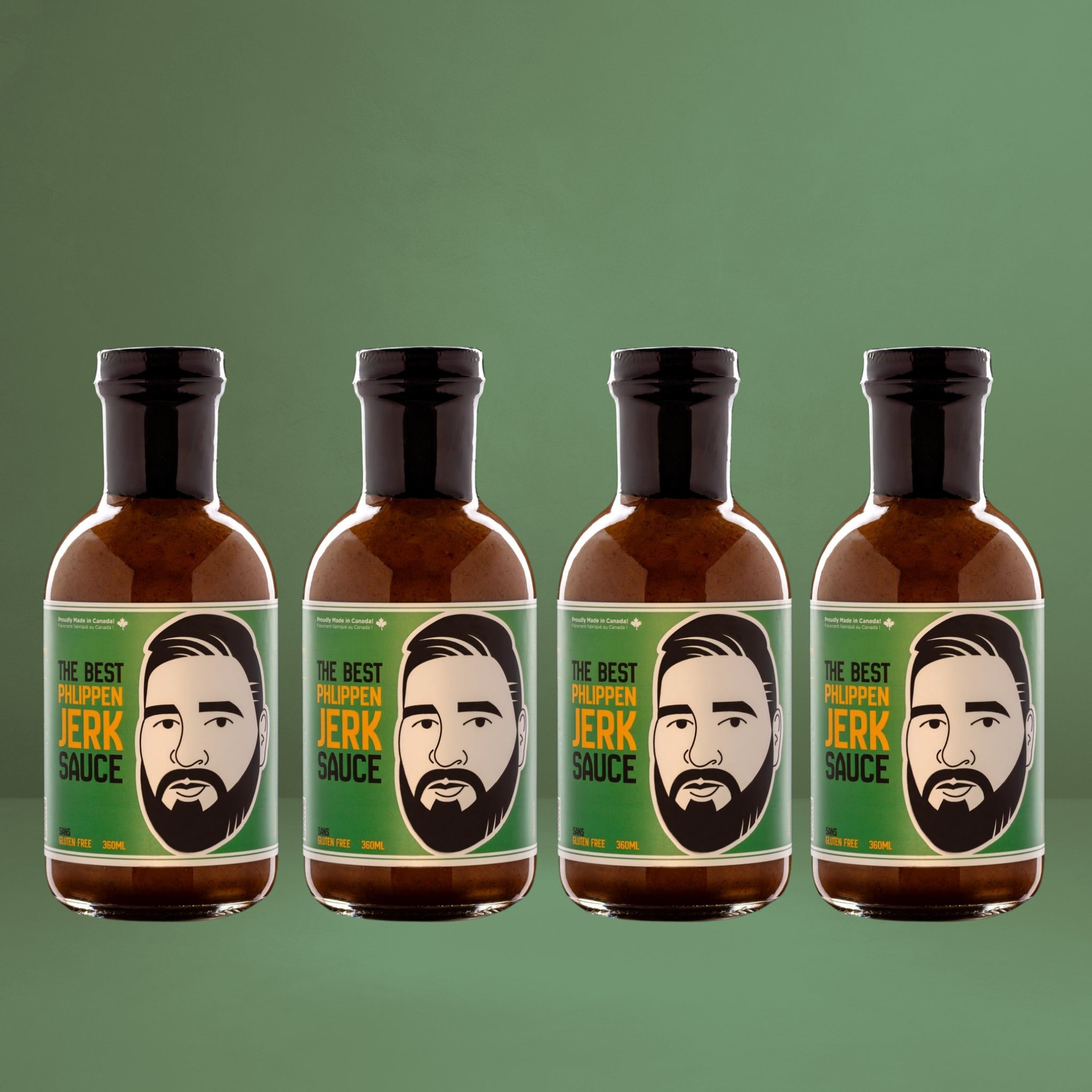 Four bottles of Phlippen Jerk Sauce, crafted in small batches with hand-smoked local ingredients, perfect as a versatile base for jerk chicken pizza or breakfast eggs.