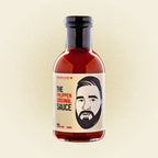 Bottle of 'The Philippen Original Sauce' with a label featuring a face on a beige background