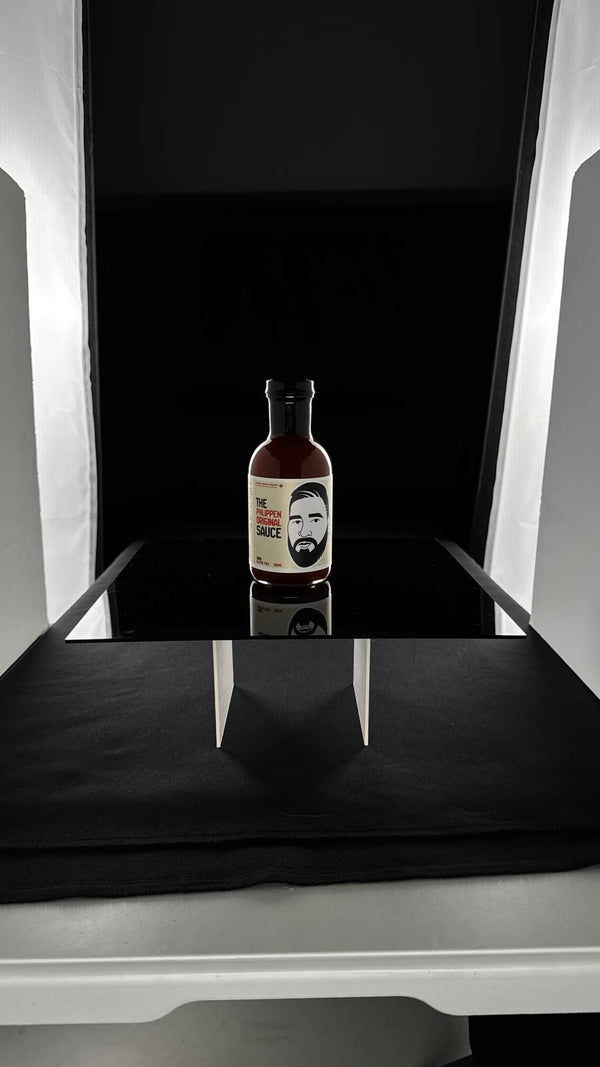 Single bottle of phlippens original in a studio shoot setting