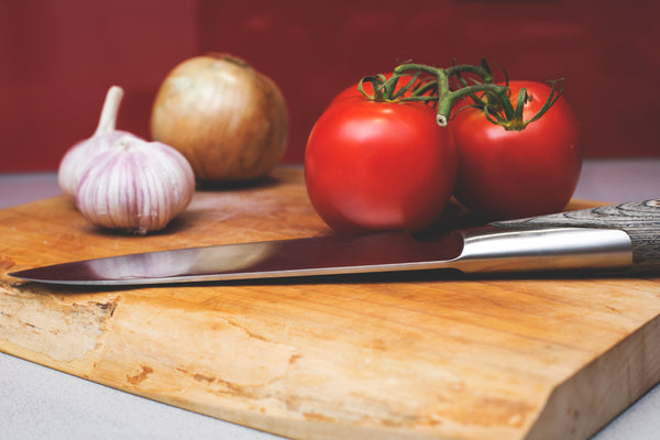 cutting board with vegetables